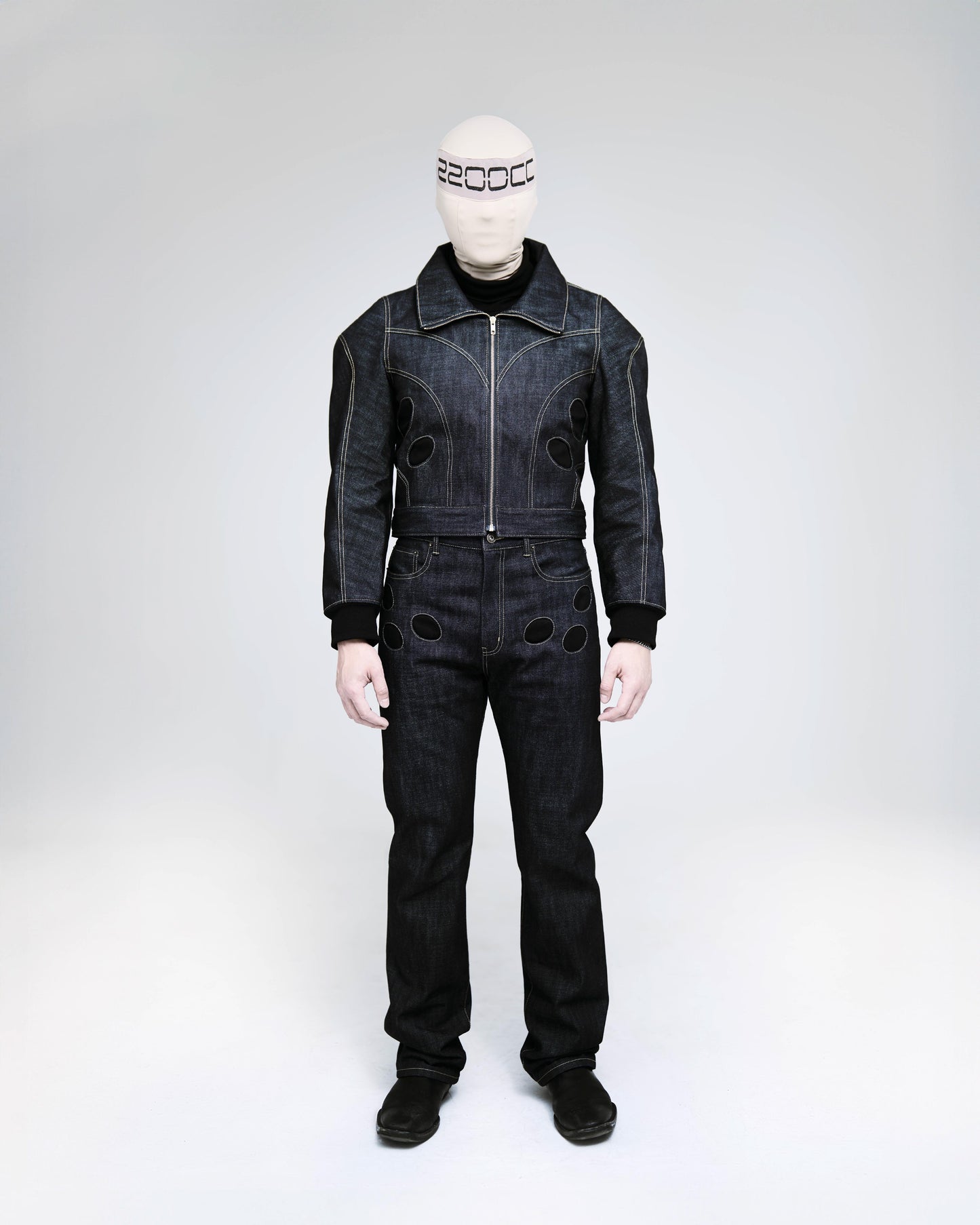 2200CC blue denim paneled jacket paired with matching cargo jeans. Both with the circular pocket feature.