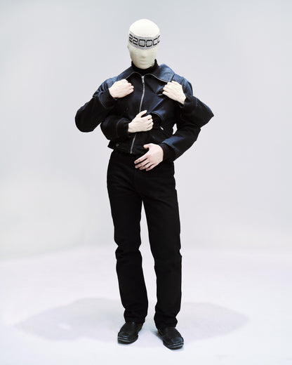 avante garde jacket with four arm sleeves, and 2 posable hands and four diagonal zippers