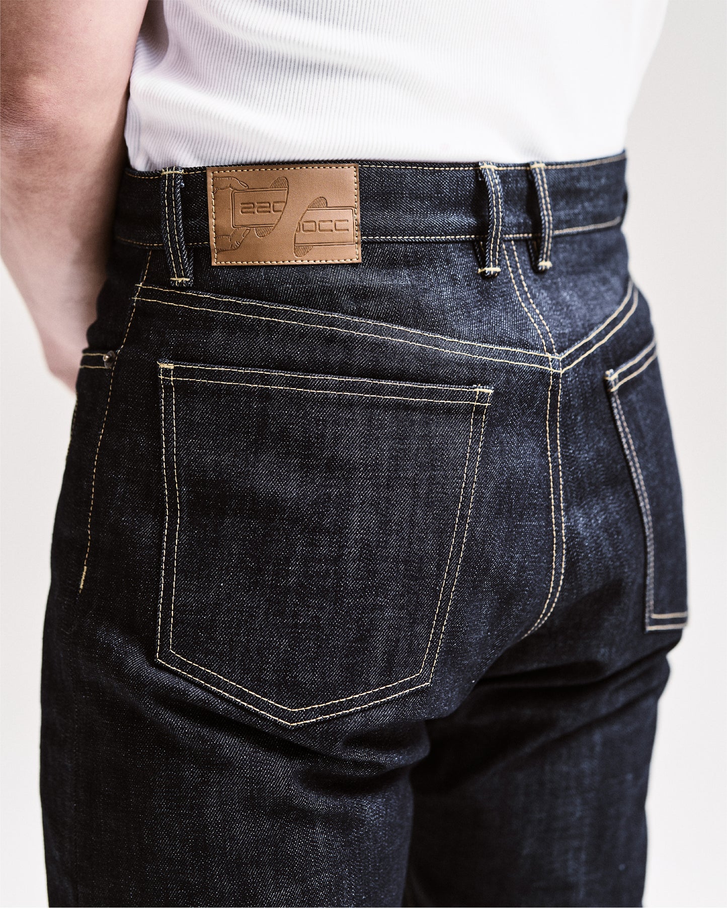 Blue denim jeans with unique 2200CC leather patch