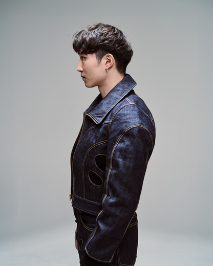 2200CC blue denim jacket with circular pockets and hand sewn detailing.  Innovative, avant garde menswear.