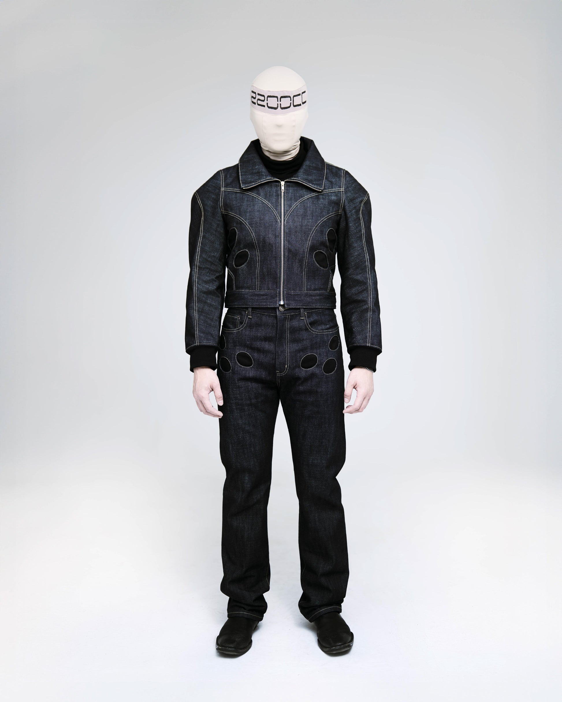 2200CC blue denim paneled jacket paired with matching cargo jeans.  Both with the circular pocket feature.