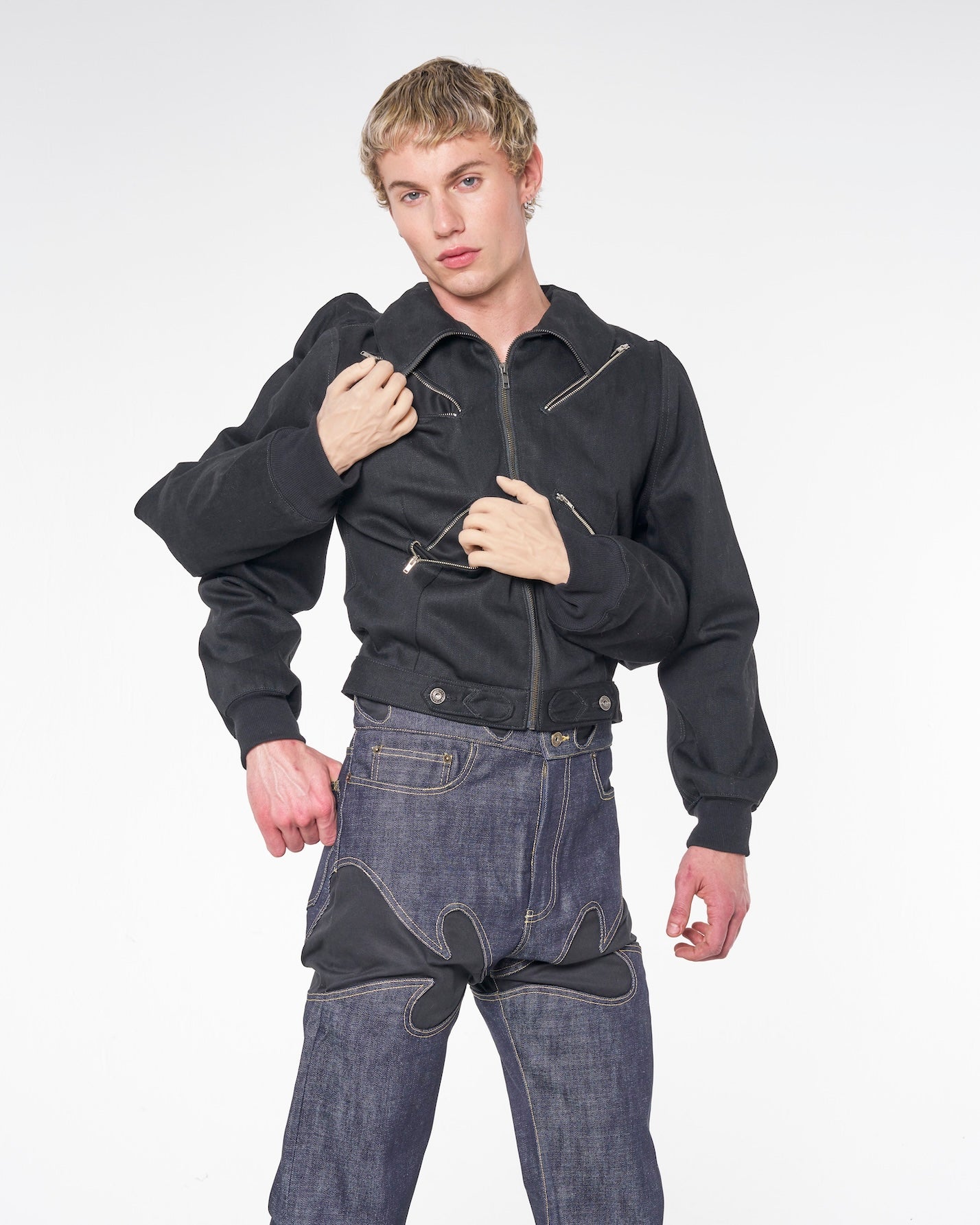 2200CC Four Arm Jacket in raw selvedge black denim with four sleeves and detachable and posable silicone hands — front view
