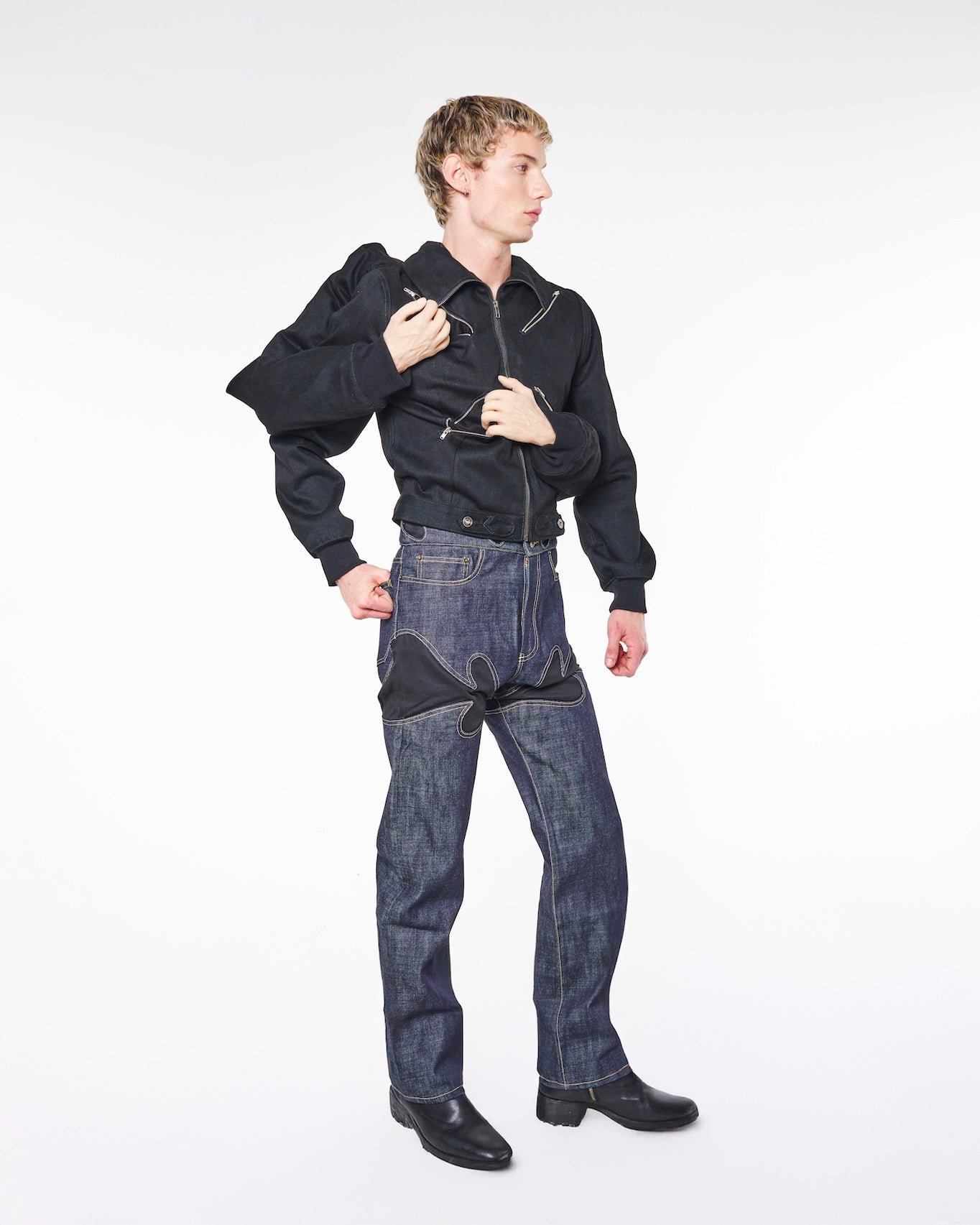 2200CC avant-garde four arm denim jacket with posable silicone hands and angled zipper pockets — side view